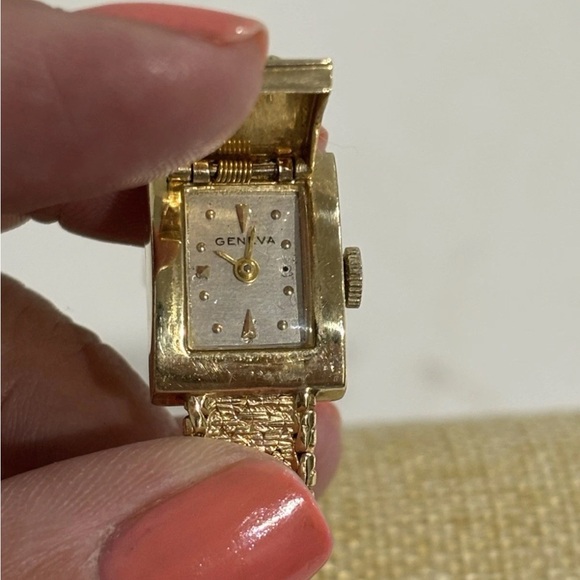 14K Ladies Hidden Watch with Floral Motif on Cover by Geneva 6.5” 23.74 grams - Picture 2 of 4